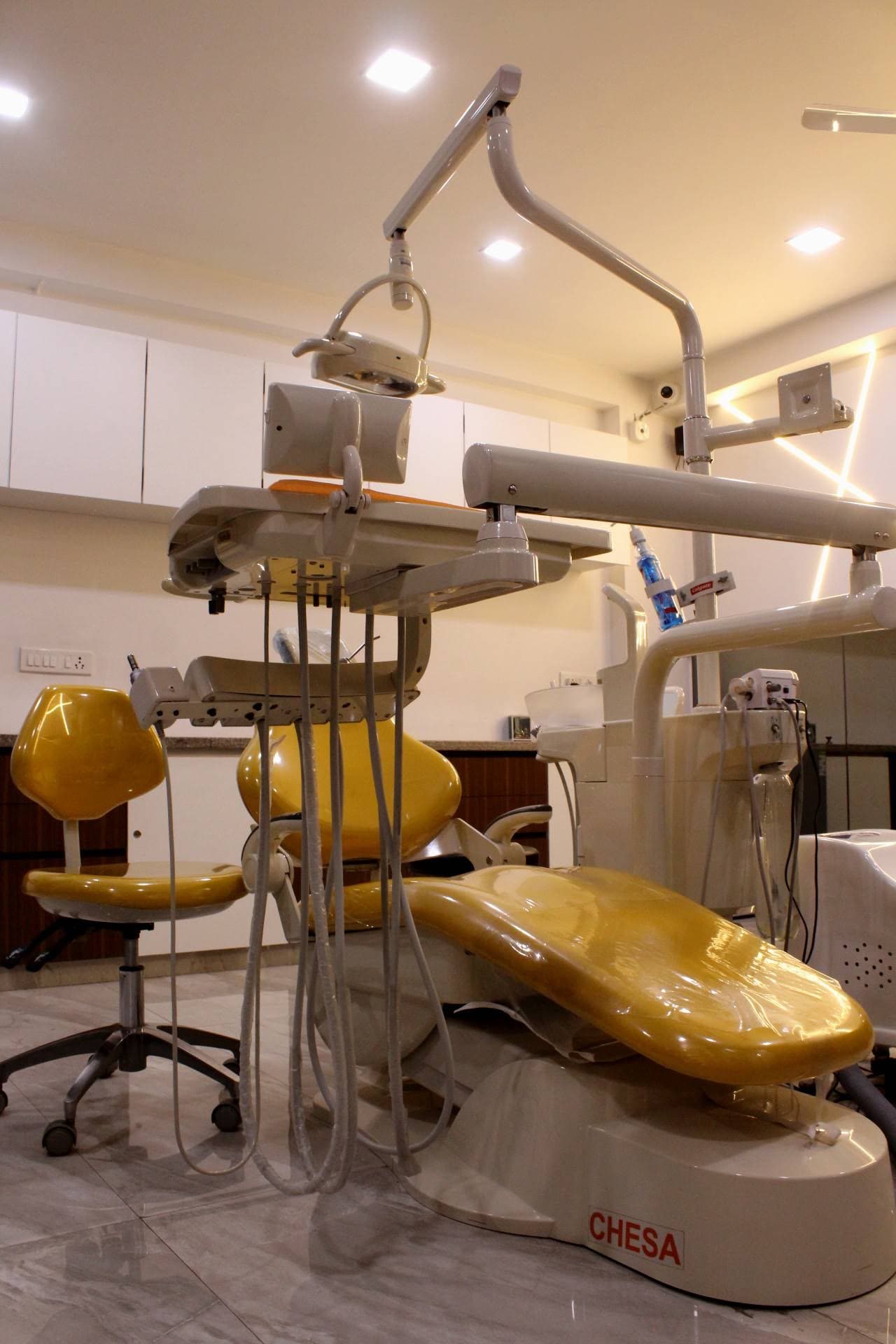 Dental chair and overhead light at Dental Beats